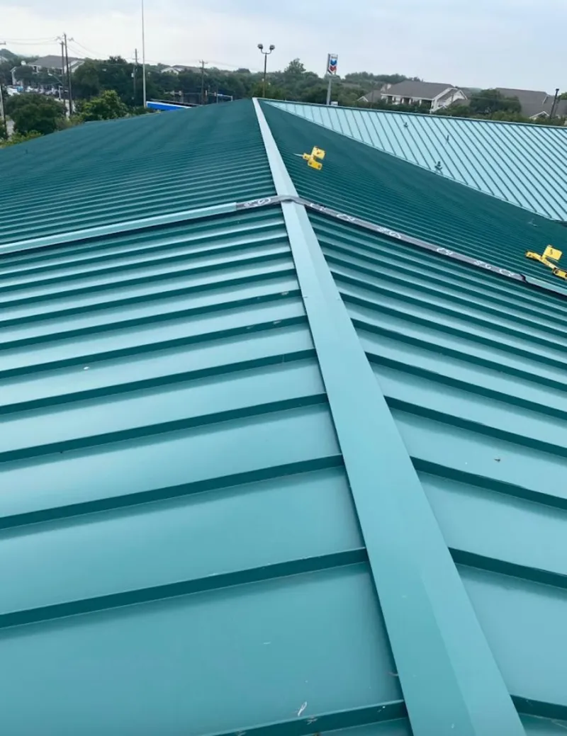 Green commercial metal roof ridge and valley for Metal Roof Repair in Tupelo